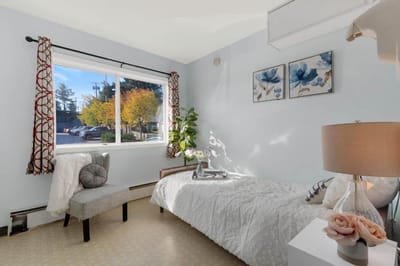 Bright, inviting resident room with decorative elements.