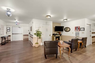 Common area with seating and TV