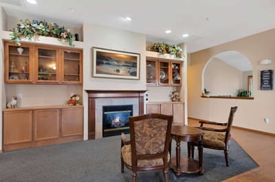 Cozy common area with seating and fireplace.