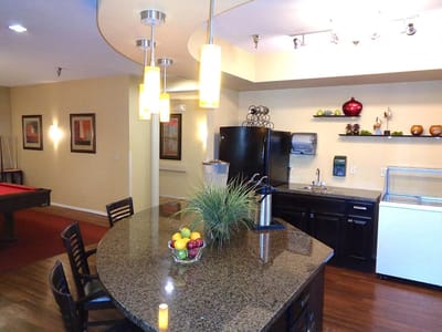 Interior kitchen and dining area with bar seating