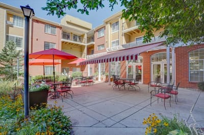 Beautiful outdoor patio area with seating and umbrellas.