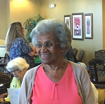 Residents engaging in a social gathering indoors.