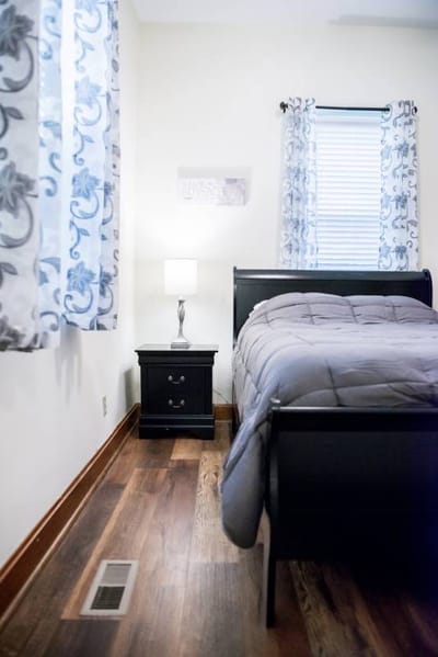 Cozy resident bedroom with natural light