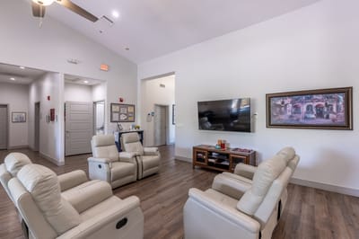 Common area with seating and television