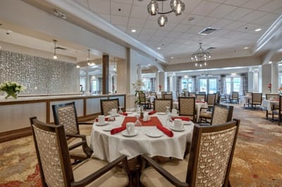 Elegant dining room set with tables and chairs