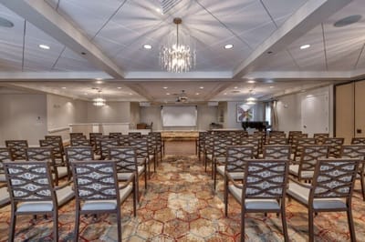 Empty activity room with chairs and presentation screen