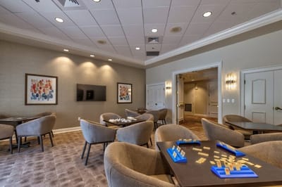 Bright common area with seating and games