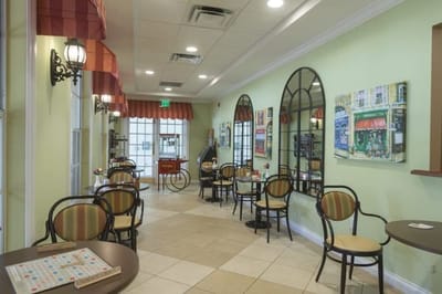 Common area with seating and artwork on the walls