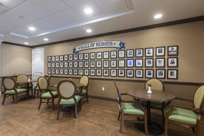 Interior view of a common area with framed photos