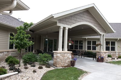 Exterior view of the facility entrance with landscaping