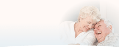 Smiling elderly couple enjoying a moment together