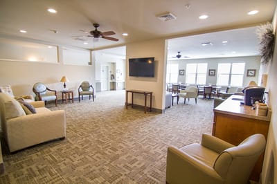 Common area with seating and a television