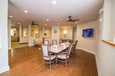 Bright common area with tables and chairs