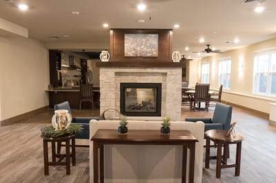 Cozy common area with seating and a fireplace