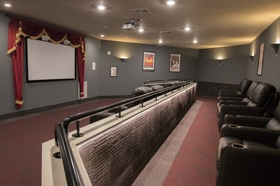 Interior of a cozy theater room with seating