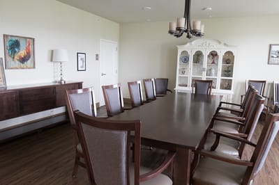 Bright dining room with a large table and chairs