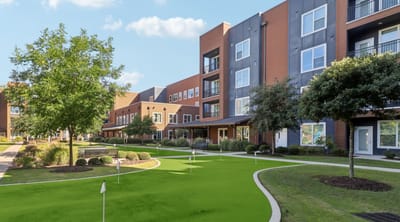 Well-maintained outdoor space with green landscaping