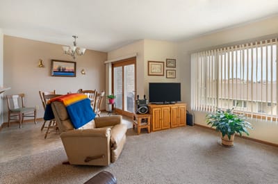 Cozy living room setup with plants and furniture