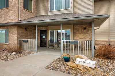 Entrance of Arrowhead Lodge Senior Living with porch