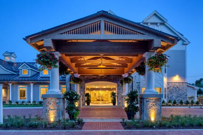 Exterior view of the facility entrance at dusk