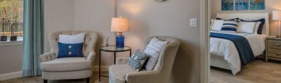 Cozy resident room with seating area and decor