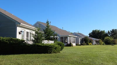 Well-maintained outdoor space with grass and shrubbery