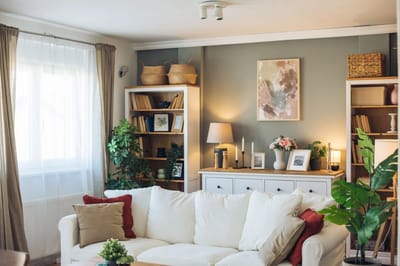 Cozy common area with a white sofa and bookshelves