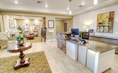 Bright lobby area with seating and reception desk