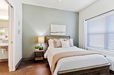 Cozy resident room with a bed and natural light