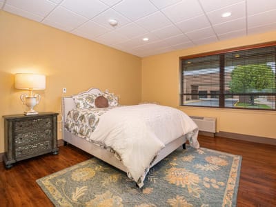 Well-furnished private resident room with a bed and window