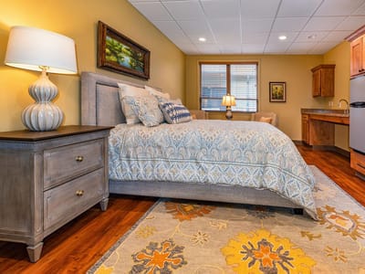Cozy resident bedroom with beautiful decor and furnishings