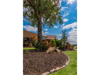 Outdoor view of landscaped grounds and facility exterior