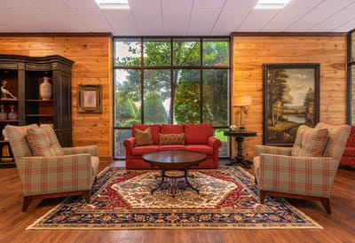 Cozy common area with seating and artwork