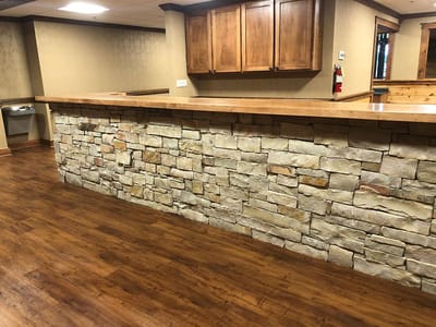 Interior view of a stone bar in common area