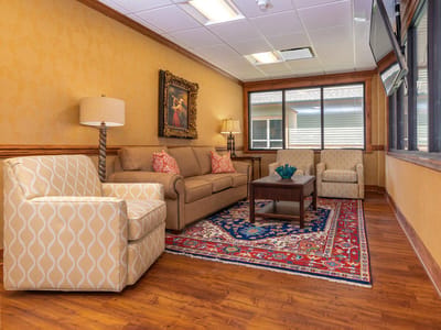 Cozy common area with seating and decorative elements