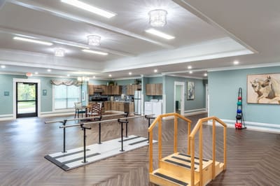 Interior view of a large activity room with equipment