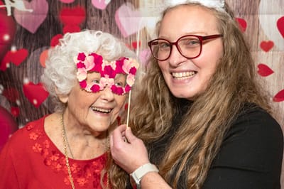 Residents enjoying a fun activity with props