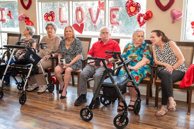 Residents enjoying a Valentine's Day celebration indoors
