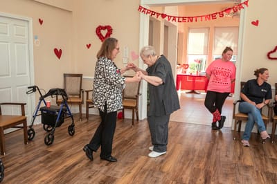 Residents dancing during a Valentine's celebration