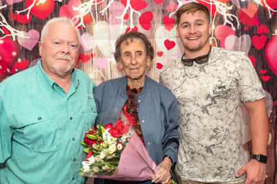 Residents celebrating with family during an event