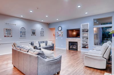 Cozy common area with seating and fireplace