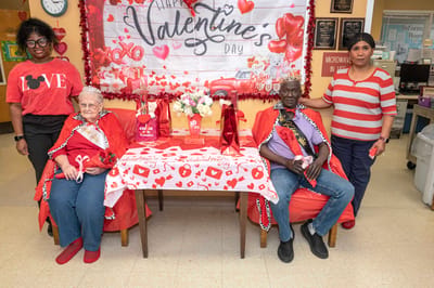 Residents celebrating Valentine's Day with decorations