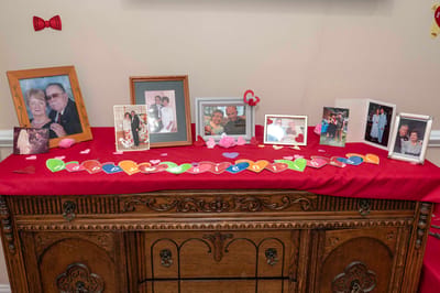 Decorative Valentine's Day display with framed photos