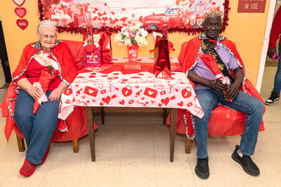Residents celebrating Valentine's Day in decorations