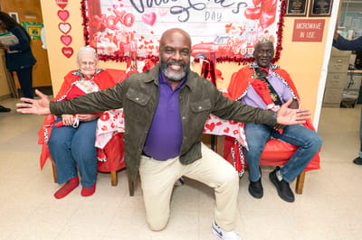 Residents celebrating Valentine's Day with staff
