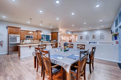 Dining area with a large table and modern decor
