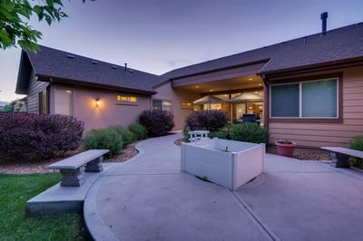 Outdoor space with pathways and garden seating