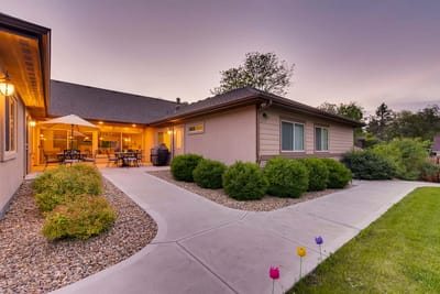 Exterior view of the facility with landscaped garden