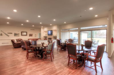 Common area with seating and tables in a living room