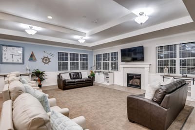 Common area with seating and a fireplace